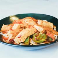 Tofu Laghman * · Vegan. Sautéed Tofu and various combinations of vegetables: celery, onions, red peppers, oys...