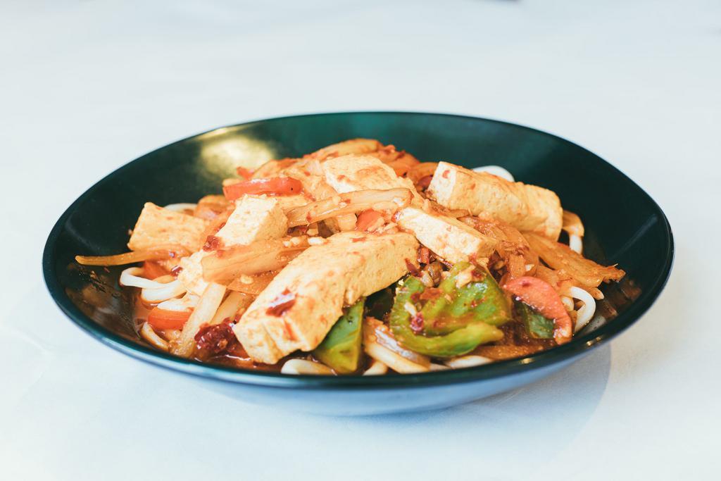 Tofu Laghman * · Vegan. Sautéed Tofu and various combinations of vegetables: celery, onions, red peppers, oyster-flavored sauce, cowpeas topped hand-pulled chewy noodles.
