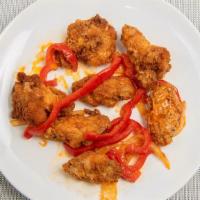 Chicken Wings · Zesty fried chicken wings - made regular or spicy.