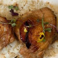 Chicken Adobo · Chicken thighs cooked adobo style, served with baby bok choy & mushrooms, garlic rice and lu...