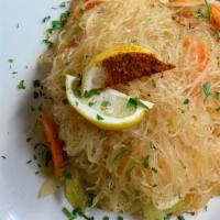 Vegetarian Pancit · Vermicelli noodles, tossed with sautéed carrots, celery, onions, snow peas, ginger, lemon, t...