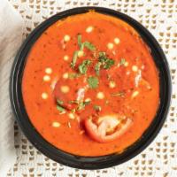 Makhani · Rich and flavorful butter sauce cooked with fresh tomatoes and aromatic spices.