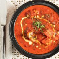 Paneer Tikka Masala · Homemade cottage cheese cooked in a clay oven & sautéed Bombay Dhabba style in a rich flavor...