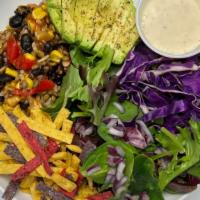 Vegan Fiesta Caesar Salad · A power blend of Rice, Grains, Black Beans, Lentils,  Avocado, Sweet Corn, Roasted Peppers, ...
