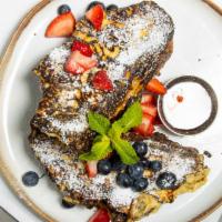 French Toast · Vegetarian. Challah bread, chocolate custard batter, pure maple syrup, powdered sugar, and a...