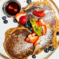 Pancakes · Buttermilk hotcakes, pure maple syrup, butter, powdered sugar, and assorted fresh berries.