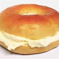 Bagel With Cream Cheese Sandwich · Bagel with cream cheese. Your choice of plain or cinnamon raisin bagel.