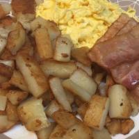 Home Fries Platter With Pork  · Home fries with your choice of eggs, meat and toast.