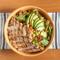 Chicken Avocado
Salad · Chopped romaine lettuce, grilled chicken, bacon, diced tomatoes, avocado, corn kernels & red...