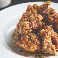 Karaage  · Japanese style fried chicken with spicy garlic soy.