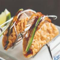 Duck Tacos · (2) pieces ~  house roasted duck, hoisin sauce, apricot sweet chili, cucumber & scallion. cr...