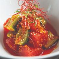 Salmon Poke* · soy marinated, cucumber and chili oil