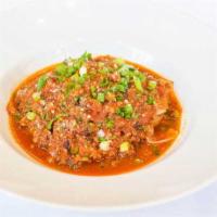 Tagliatelle Bolognese · With braised veal, beef, pork, tomato sauce.