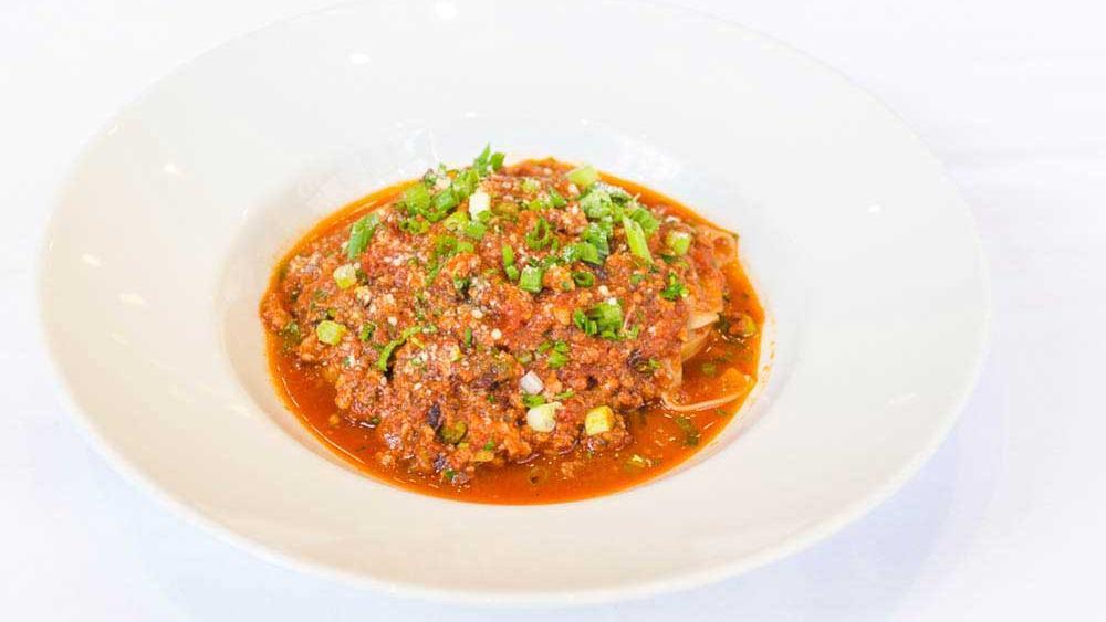 Tagliatelle Bolognese · With braised veal, beef, pork, tomato sauce.