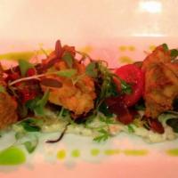 Crispy Fried Oysters Blt · With baby lettuce, tomatoes, bacon, house tartar sauce.