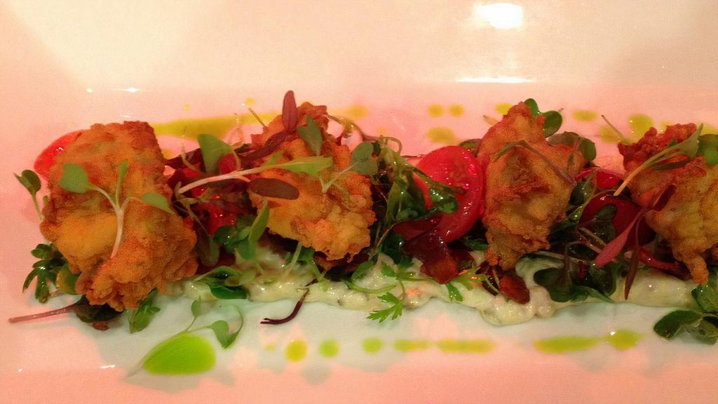 Crispy Fried Oysters Blt · With baby lettuce, tomatoes, bacon, house tartar sauce.