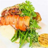 Pan Roasted Maine Lobster · Served with creamy potatoes, green beans, lemon tarragon butter.