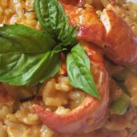 Maine Lobster Risotto · With asparagus, fresh herbs, lobster cream.