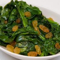 Tonino’S Spinach Alla Romana · Spinach sauteed with pine nuts, raisins, shallots and olive oil