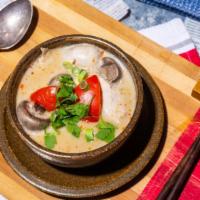 Tom Kha Gai · Coconut soup. A delicious soup with coconut milk, thai seasoning accented with galangal, lim...