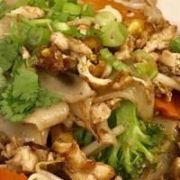 Tofu Pad Sen Yai · Stir-fried large flat rice noodles, egg, broccoli, carrot, and bean sprout in homemade delic...