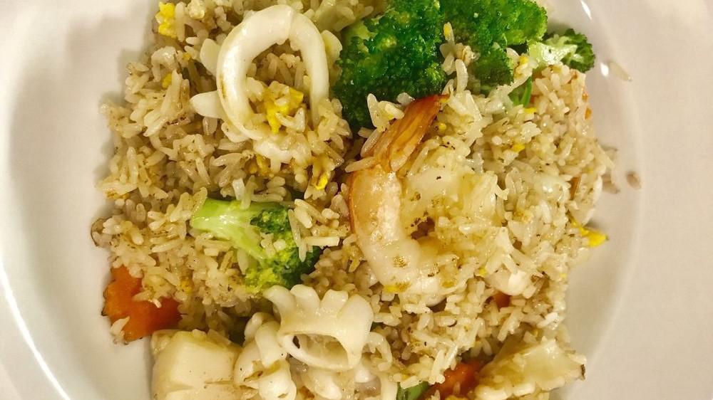 Seafood Fried Rice · Stir-fried rice with shrimp. Squid and scallop, egg, onion, broccoli and carrot in a house special sauce.