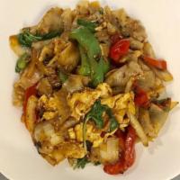 Drunken Noodle · Stir-fried large flat rice noodles, with choice of your meat, red and green peppers, and oni...