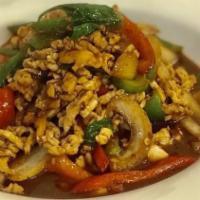 Gai Gapaw · Stir-fried ground chicken with onions, peppers in hot spicy basil sauce.