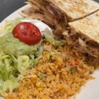 Quesadilla Carnitas · Two grilled flour tortillas grilled with shredded pork, Mexican Salad, and rice on the side.