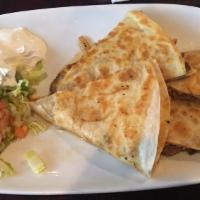 Quesadillas · Fire-roasted peppers, caramelized onions and cheddar jack cheese inside a crispy tortilla, s...