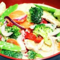 Thai Red Curry · Mixed vegetables simmered in Thai red curry spices, coconut milk and Thai basil. Comes with ...