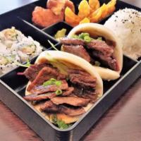 Bao Bao Bento · Chef choice sushi roll, appetizer, rice and soup or salad. Comes with choice of protein.
