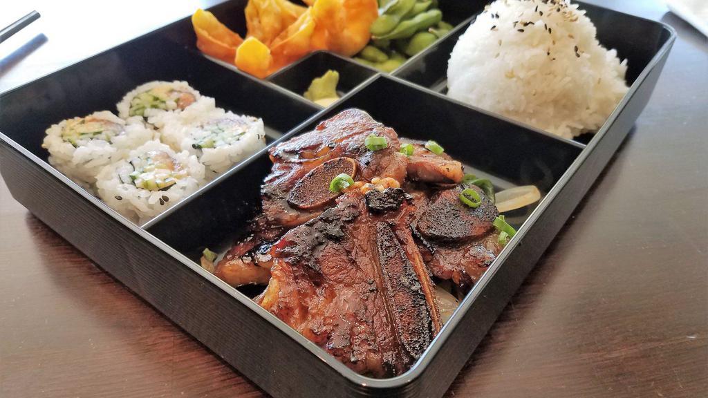 Korean Bbq Galbi Bento · Chef choice sushi roll, appetizer, rice and soup or salad. Comes with choice of protein.