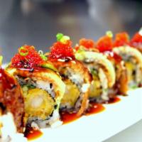 Green Monster · Shrimp tempura and cucumber inside, topped with unagi, avocado, tobiko and eel sauce.
