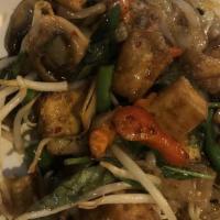 Drunken Noodle ** · Stir fried flat rice noodles with a choice of meat with red pepper, onions, string bean, sno...