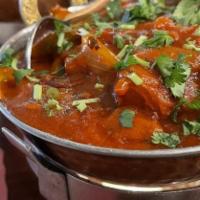 Lamb Chilli Masala · Finely chopped lamb pieces cooked with a touch of vegetables in an authentic Indian spicy he...
