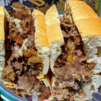 Philly Cheesesteak · 8 oz. steak with American cheese & fried onions on a long roll.