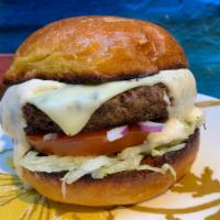 Mom'S Burger · 7 oz. burger with American cheese, lettuce, tomato, onion, horseradish sauce on a brioche bun.