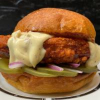 Vegan Nashville Hot Chickn Sammy · House made vegan Nashville hot fried chicken sammy with red onion, dill pickles, lemon peppe...