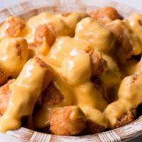 Cheesy Tots · Tater Tots with Cheese Whiz