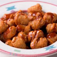 Bbq  Chipotle Tots · Tater Tots with with Chipotle Cream and Sweet Spicy BBQ Sauce