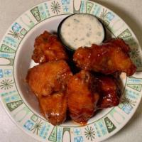 Classic Sweet Smokey Bbq Wings · One pound of smokey sweet Thai Chili BBQ chicken wings with ranch dressing.
