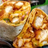 Classic Sweet Sriracha Chicken Wrap · Another TMoms classic is back! 

Crispy  chicken tossed in sweet sriracha sauce, with lettuc...