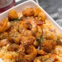 Seafood  Mac · Creamy Cheese sauce with Tender Shrimp, Bay Scallops and Crab meat