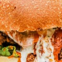 Crispy Buffalo Chicken Sandwich · buttermilk fried chicken breast dipped in homemade buffalo sauce topped with blue and pepper...