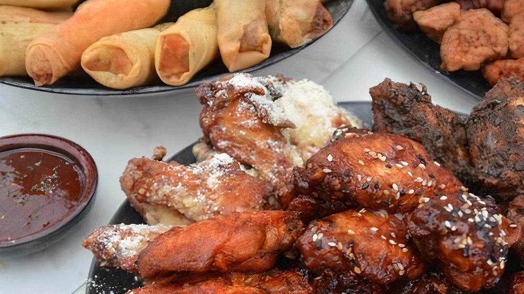 Small  Party Gathering Platter · Includes: 25 Boneless and 25 Bone In Wings with 4 Vegetable Spring Rolls, 4 Cheesesteak Spring Rolls and 4 Buffalo Chicken Spring Rolls