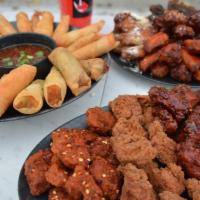 Jumbo Party Platter · Includes: 50 Boneless and 50 Bone In Wings with 6 Vegetable Spring Rolls, 6 Cheesesteak Spri...