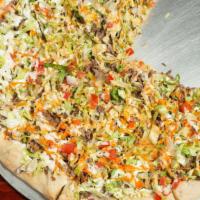 Taco Pizza · Mozzarella topped with steak, chopped onions, lettuce, tomatoes, hot sauce and bleu cheese.