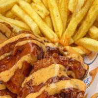 Bbq Chicken Tenders With Fries  · Fresh hand breaded, golden fried chicken tenders dipped in BBQ sauce. Served with fries.