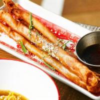 Sweet Potato Spring Rolls · Hand-rolled, lightly-fried imperial spring rolls filled with sweet potato purée. Served with...